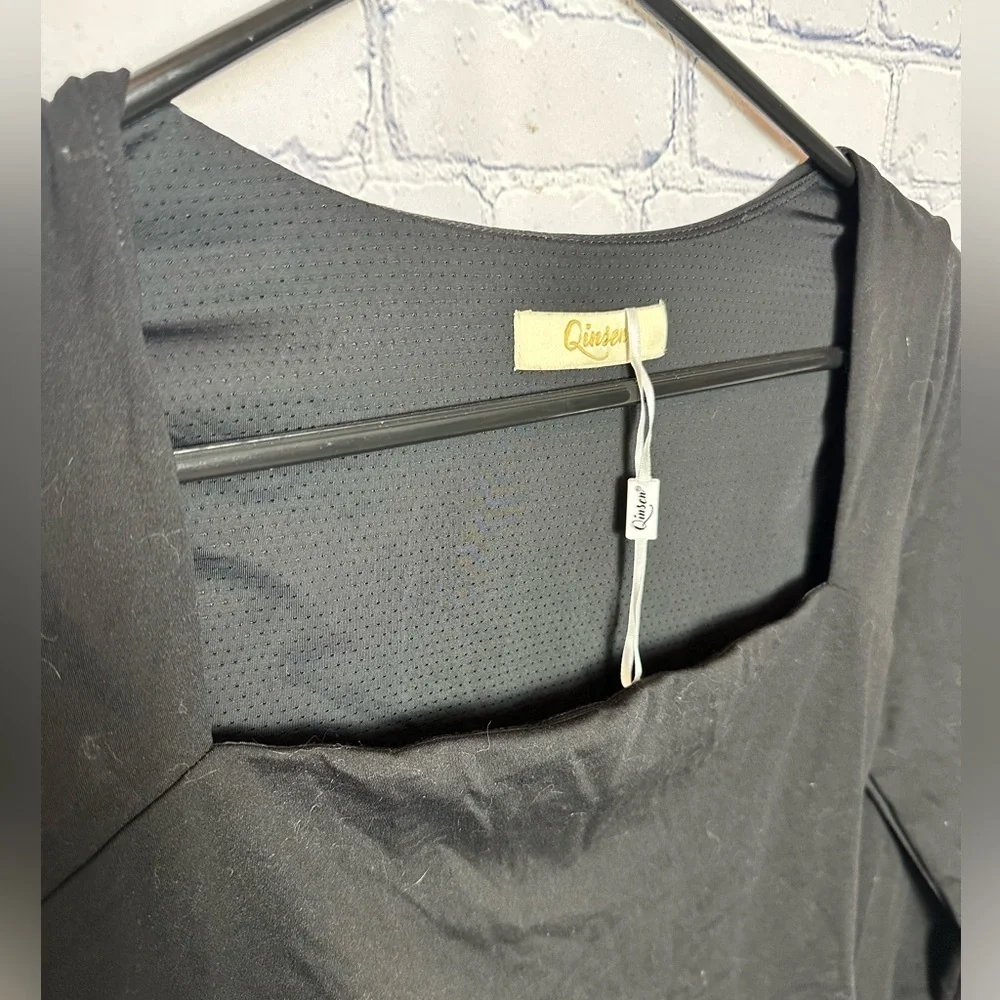 Be the Life of the Party with Quinsen’s Sexy Black Peplum Dress - Picture 2 of 6